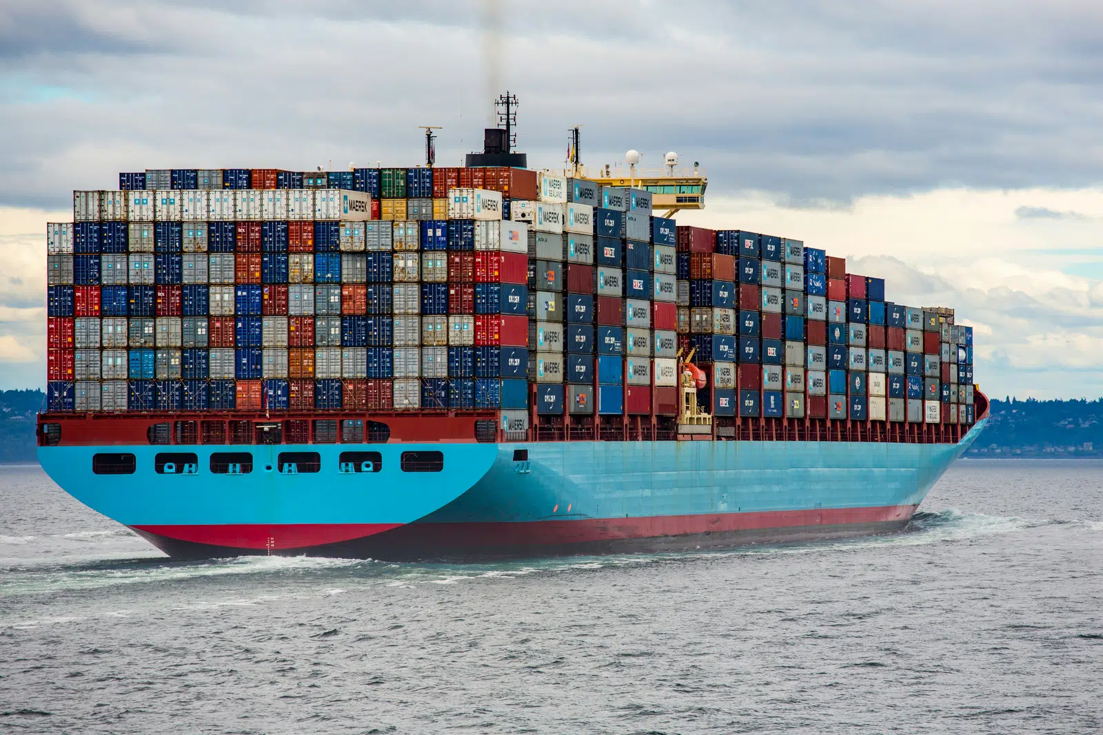 Container ship loaded with cargo containers at sea